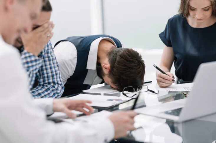 Man having burnout at work
